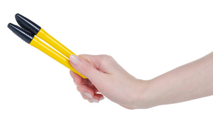 Construction yellow marker in hand on white background isolation