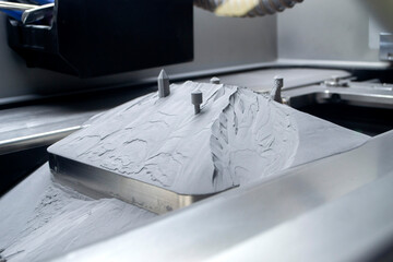 Surface with printed objects on metal 3D printer, covered metal powder inside of metal 3D printer....