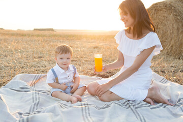 Mother and her son on holiday at a picnic.