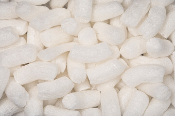 Full frame macro shot of white polystyrene packaging material in pellet shape