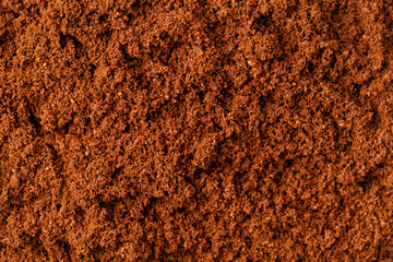 Ground coffee. Texture background with coffee, close up, top view