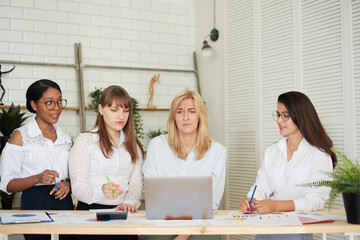 Group of diverse business women leaders working together at the office. Women only business office