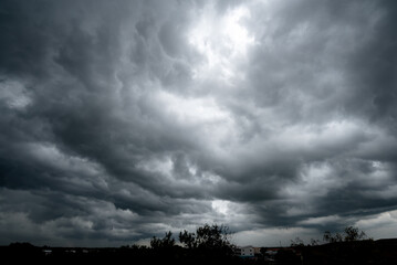 Fototapeta premium dark storm clouds with background,Dark clouds before a thunder-storm.