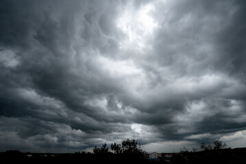  dark storm clouds with background,Dark clouds before a thunder-storm.