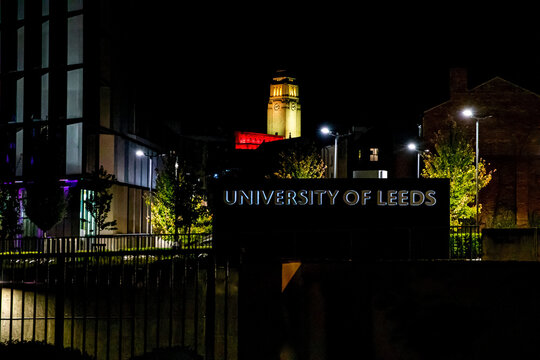 University Of Leeds Sign With Parkinson Building In The Rear By Night