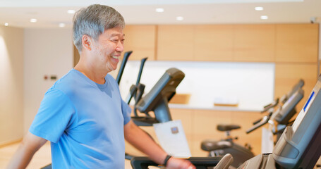 man running on treadmill