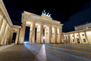 Night cityscape of the famous city gate Brandenburger Tor in the evening, Neoclassical monument,...