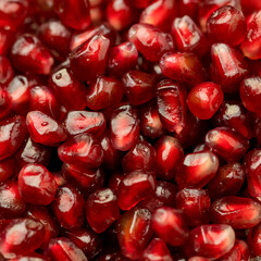 Macro of peeled ripe seeds pomegranate.
