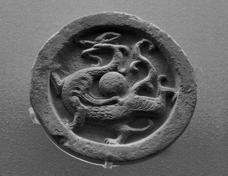 Circular tile animal totem carving in Han Dynasty of China