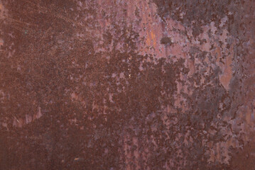 Rusty iron. The texture of the old rusty metal sheet. Closeup.