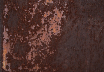 Rusty iron. The texture of the old rusty metal sheet. Closeup.