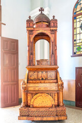 Colonial wooden furniture in Our Lady of Charity of El Cobre which is a basilica church in Santiago de Cuba, Cuba
