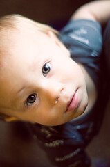 child staring into space