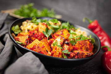 Baked Tofu with Harissa Sauce With Cauliflower Couscous