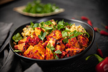 Baked Tofu with Harissa Sauce With Cauliflower Couscous