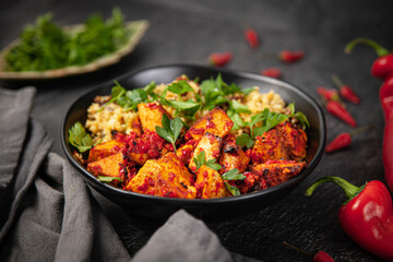 Baked Tofu with Harissa Sauce With Cauliflower Couscous