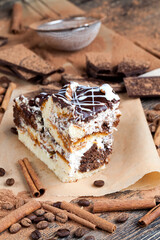a multi-layered cake made of chocolate and cream cakes