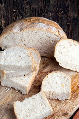 sliced pieces of gray bread from second-rate flour
