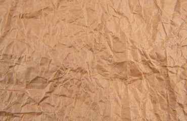 Brown crumpled paper background vignette