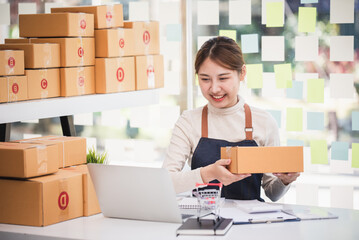 Small start-up business owners checking parcels at work, salespeople, checking production orders. Pack products for delivery to customers Sell ​​Ecommerce Shipping Ideas