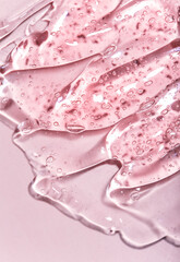 Beauty serum gel texture clear skincare cream with bubbles background