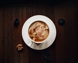 cup of coffee on wood table