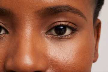 Close-up of woman's brown eye