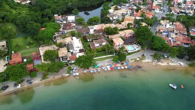 Praia da Azeda with beautiful turquoise water amidst the mountains and nature. Paradise. Top view. drone. Armacao de Buzios, Rio de Janeiro, Brazil