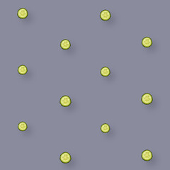 Colorful pattern of fresh cucumbers slices on grey background. Top view. Flat lay. Pop art design