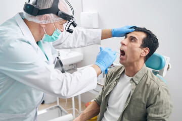 Portrait of man with doctor at the hospital