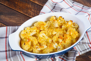 Diet food. Baked cauliflower with cheese, cream and eggs