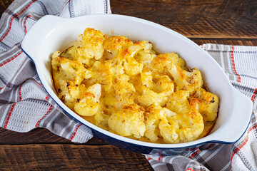 Diet food. Baked cauliflower with cheese, cream and eggs
