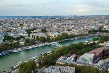 Fototapeta premium Aerial view of the city of Paris with the nice Seine river seen from the Tour Eifel