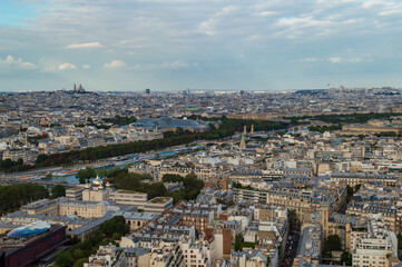 Fototapeta na wymiar Aerial view of the city of Paris with the nice Seine river seen from the Tour Eifel