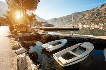 Fishing boats on waves on mediterranean european coast