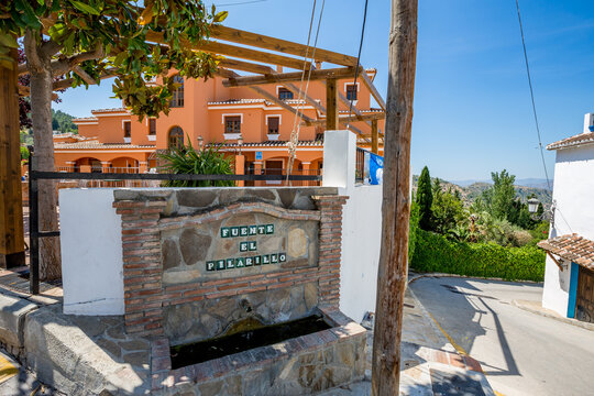 Public old water source. Travel photograph, wonderful sunny spring day, Alcaucin, Malaga, Andalusia, Spain