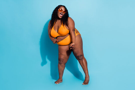 Full length photo of chubby stylish trendy big conscious lady dance season summer club isolated over blue color background