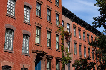 Row of Colorful Old Brick Residential Buildings in Greenwich Village of New York City