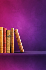 Row of old books on purple shelf. Vertical background