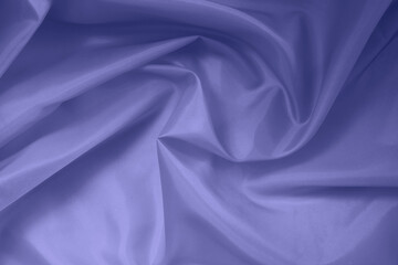 Texture of color of the year is very peri close up silk fabric