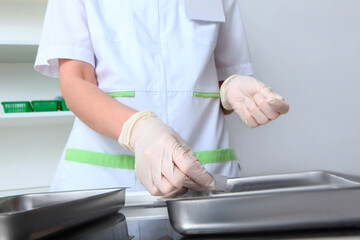 Close-up of the nurse's hands. Preparation of medical instruments. Medical laboratory.The concept of healthcare.