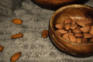 almonds in a wooden spoon