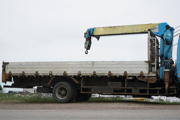  tow truck. truck crane  on white sky background. Side view.