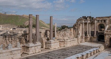 Obraz premium View of the Columns Colonnade behind the Stage of the famous Roman Theatre at Beit Shean National Park, Jordan Valley, Northern Israel, Israel