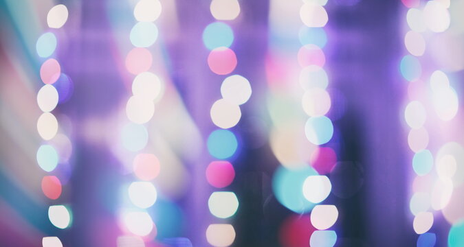 Abstract bokeh background. Christmas and New Year feast bokeh background with copyspace. Festive lights bokeh background. Glitter vintage lights background with lights defocused