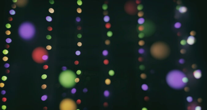 Abstract bokeh background. Christmas and New Year feast bokeh background with copyspace. Festive lights bokeh background. Glitter vintage lights background with lights defocused