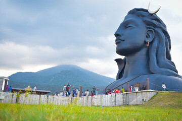 ISHA YOGA BEAUTIFUL SCULPTURE ADIYOGI LORD SHIVA STATUE WITH BLUE SKY MOUNTAIN BACKGROUND
