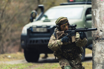 Combat tactical crosshair aim from a maverick rifle by a female soldier. High quality photo