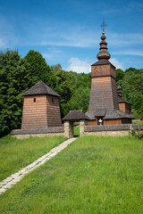 Fototapeta na wymiar The Greek Catholic wooden church of St Paraskieva in a village Potoky, Slovakia