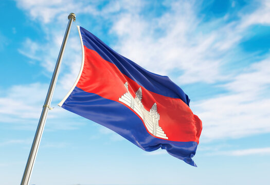 3d rendering Cambodia flag waving in the wind on flagpole. Perspective wiev Cambodia flag waving a blue cloudy sky